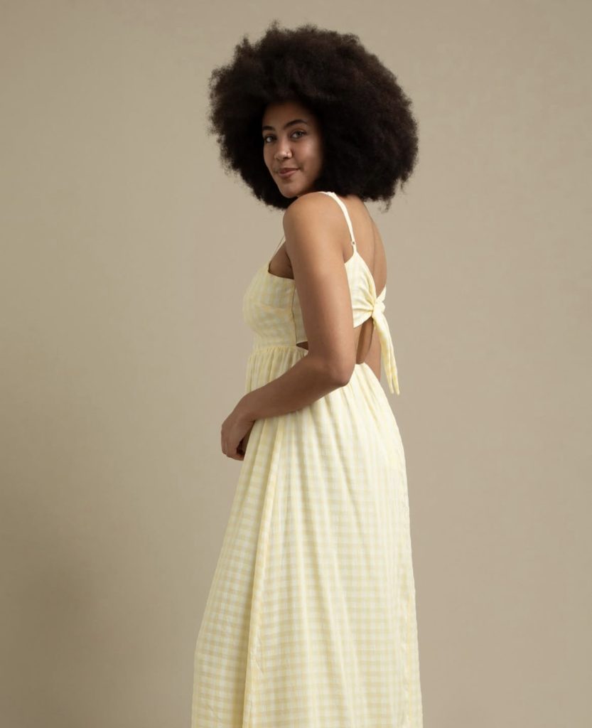 A beautiful lady wearing a lovely baby yellow maxi dress
