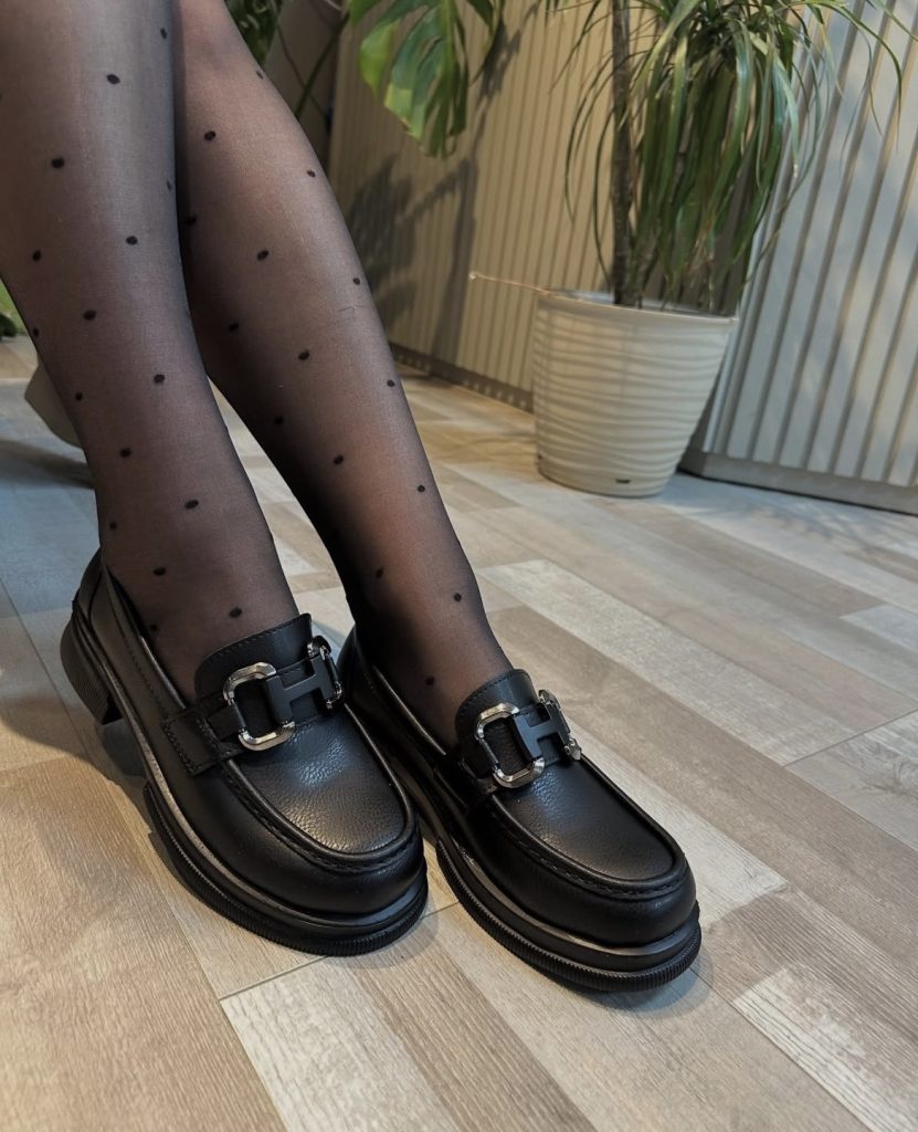A black loafer with a little bit of chunky sole