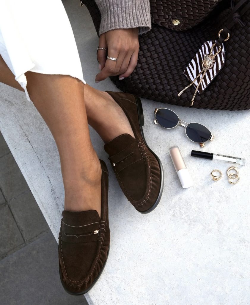 A pair of coffee brown loafers