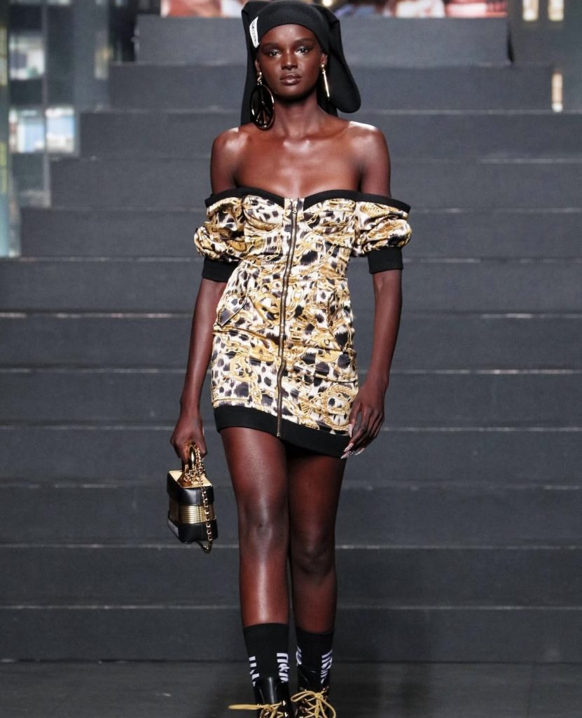A beautiful black lady rocking a gorgeous H&M print dress