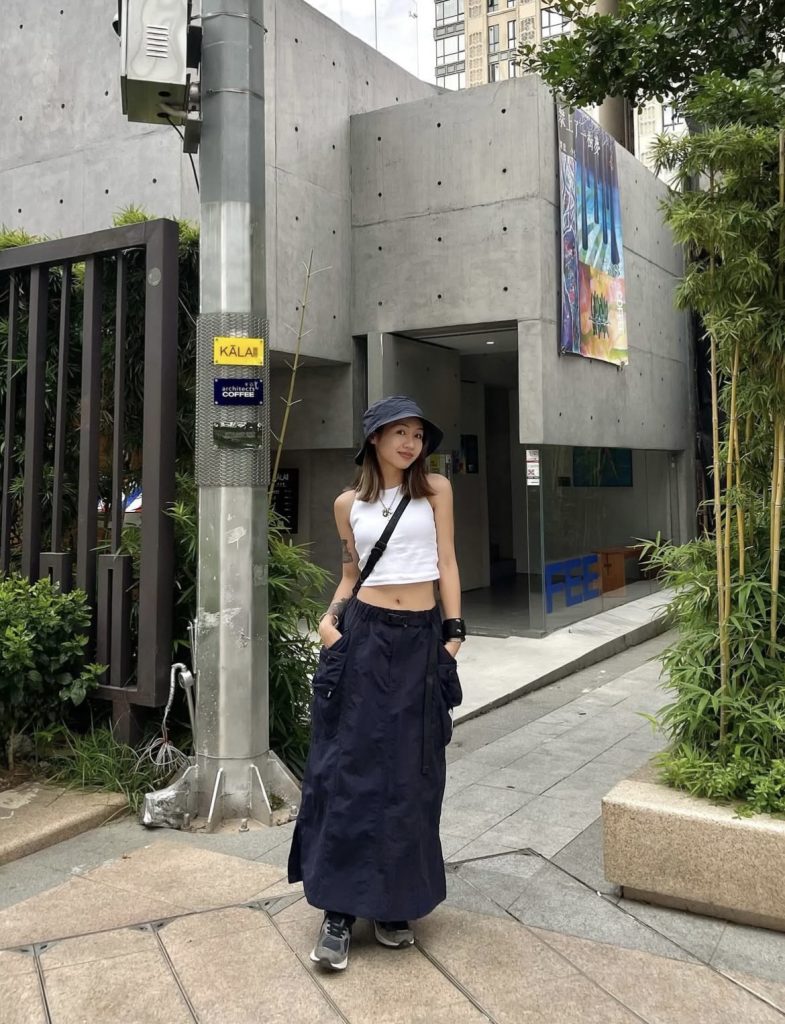 A beautiful well dressed white lady looking stylish
