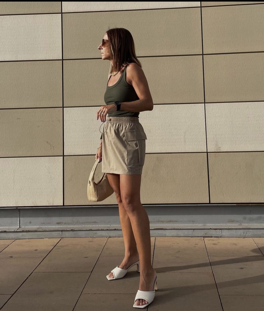 A beautiful lady wearing a short cargo skirt