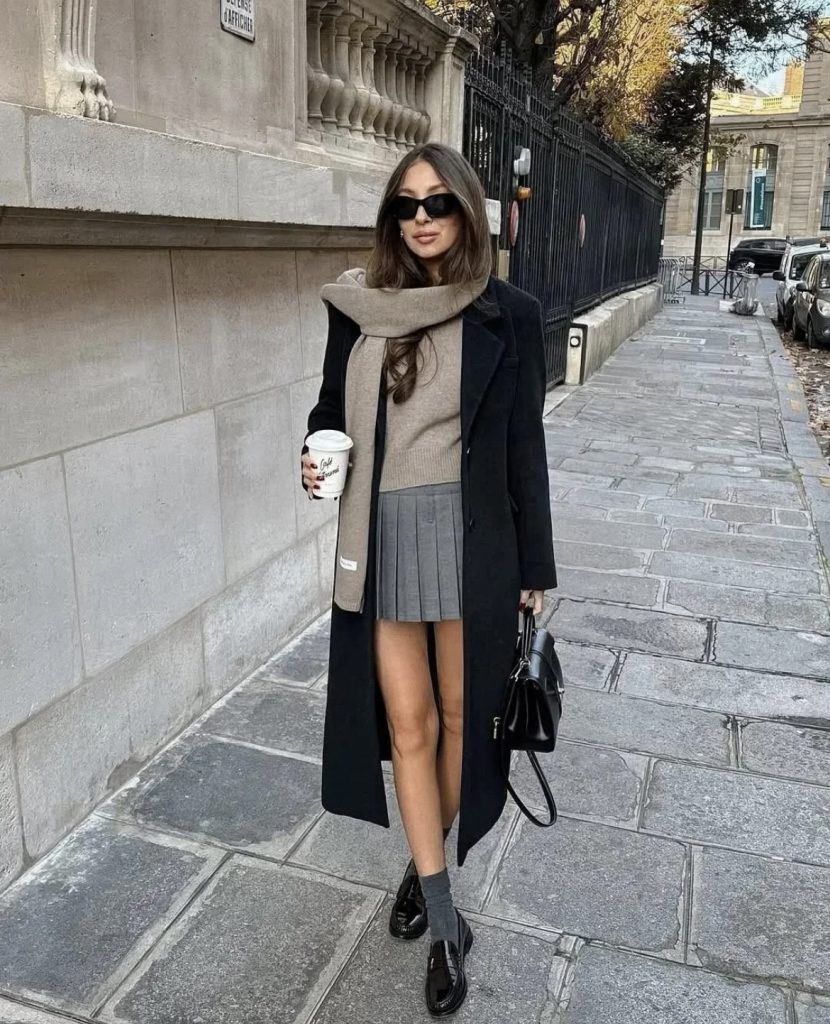 A lady styled casually with matching shoes and bag