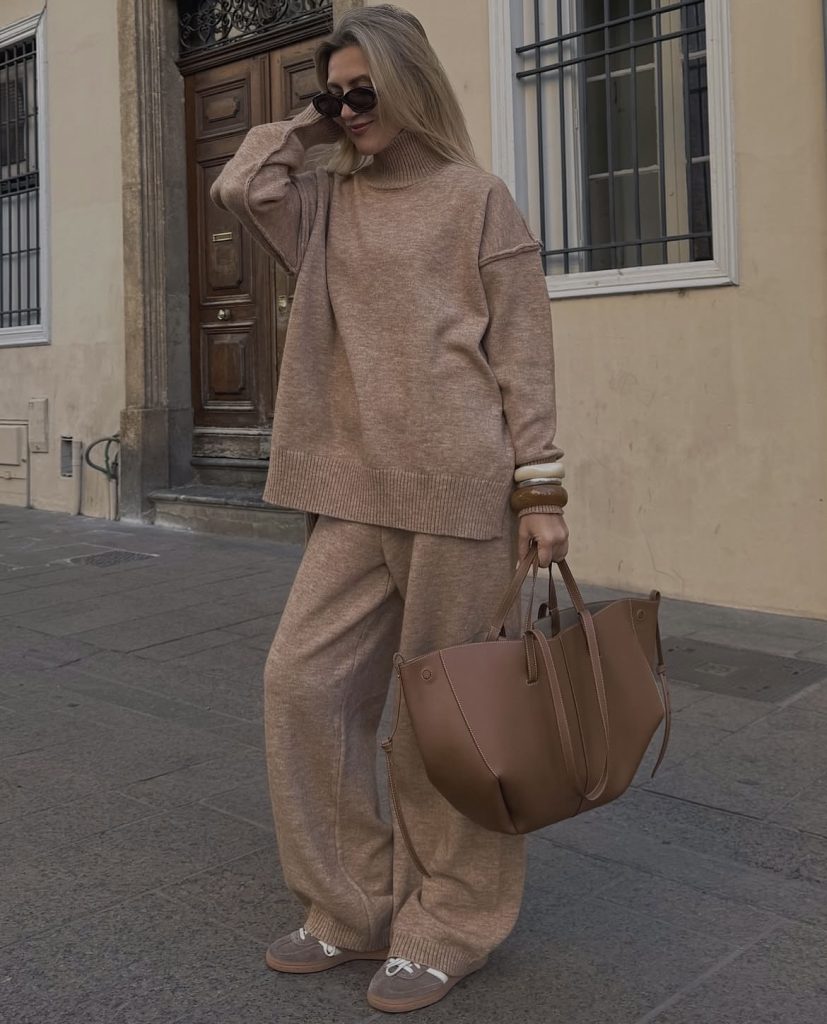 A beautiful lady wearing a brown two piece knitwear