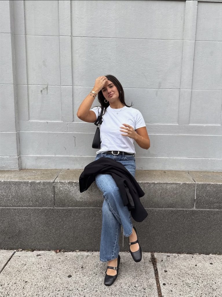 A lady wearing a cute white tee
