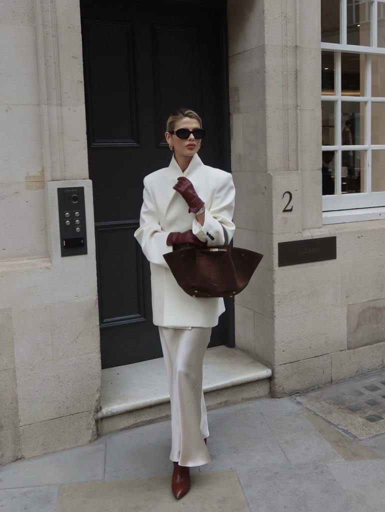 A lady accessorizing in a very classy way