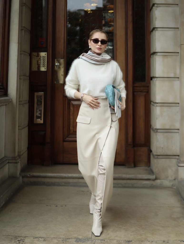 A beautiful lady styling white in fall